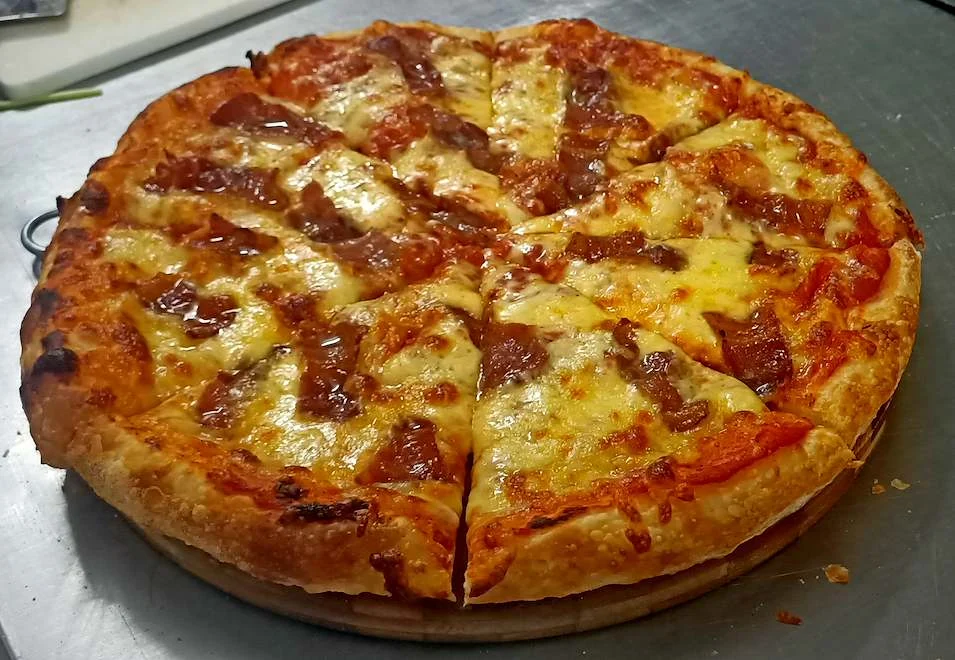 Freshly baked pepperoni pizza at The Social in Quy Nhon